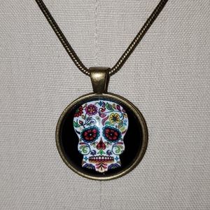 Handmade sugar skull necklace.